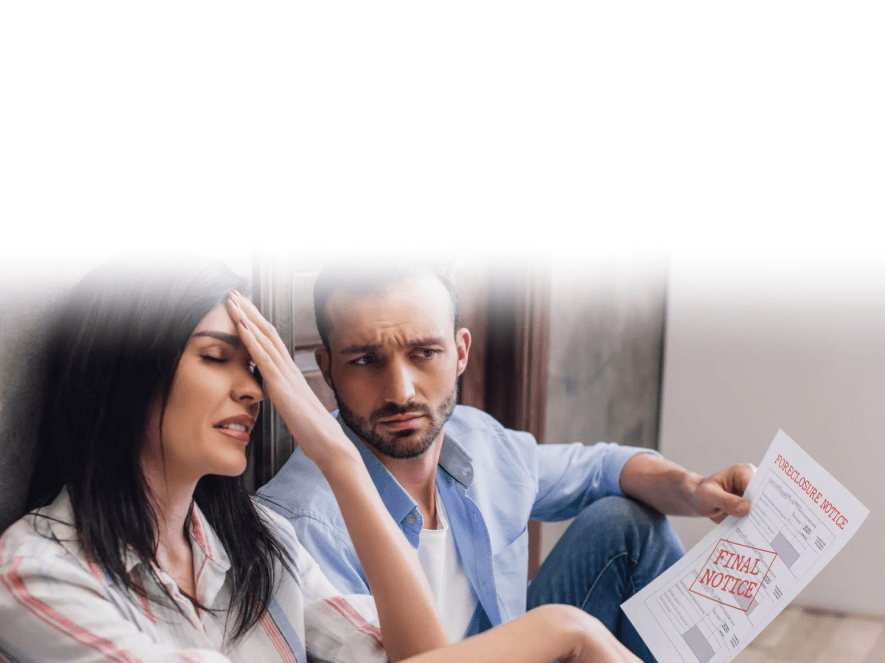 Worried couple reading a final notice letter